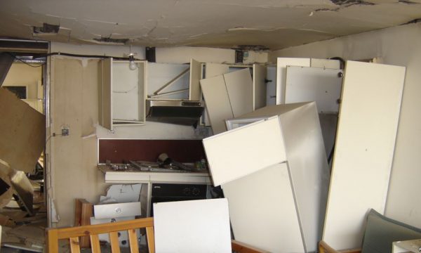 room showing destruction from blast