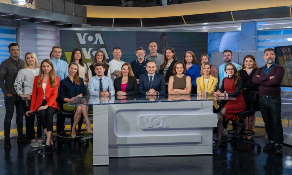a group of people in a TV studio